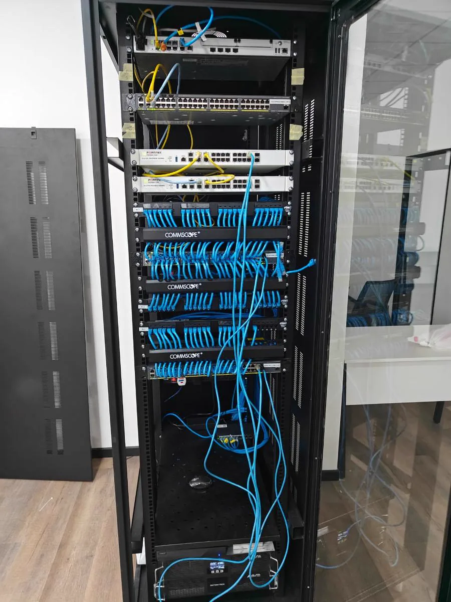 TKWIT business network rack with switches, patch panels and structured cabling at a commercial site in Sri Lanka